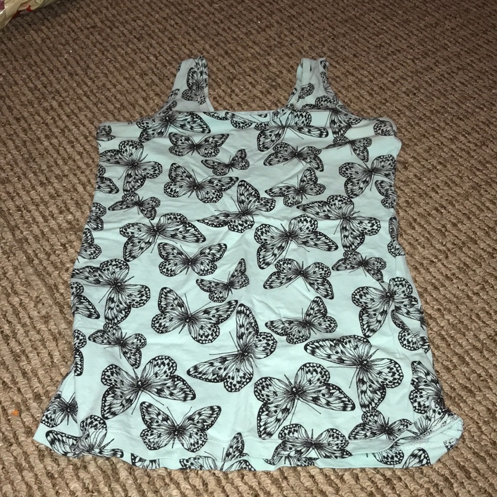 A Woman’s tank top with butterflies